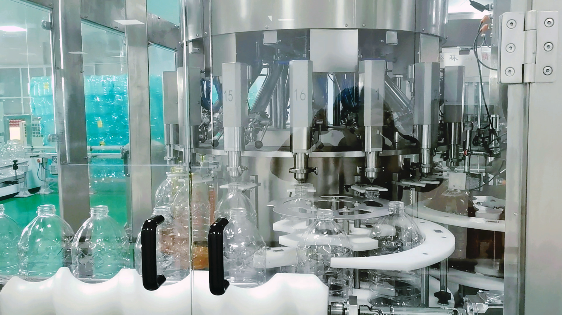 精廣旋轉稱重式灌裝機 精廣旋轉稱重式灌裝機